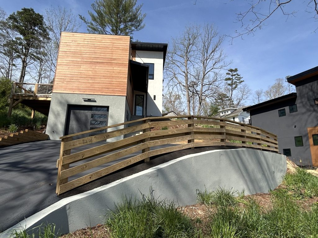 Modern hillside retaining wall system engineered for slope stabilization, drainage control, and long-term structural support