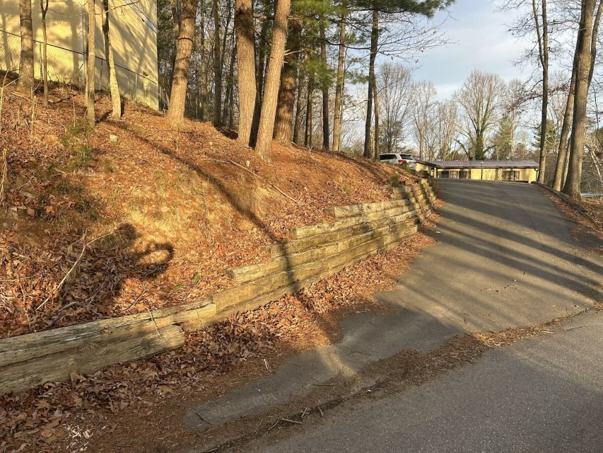 Retaining wall installation on hillside property in Pittsburgh designed for slope stability